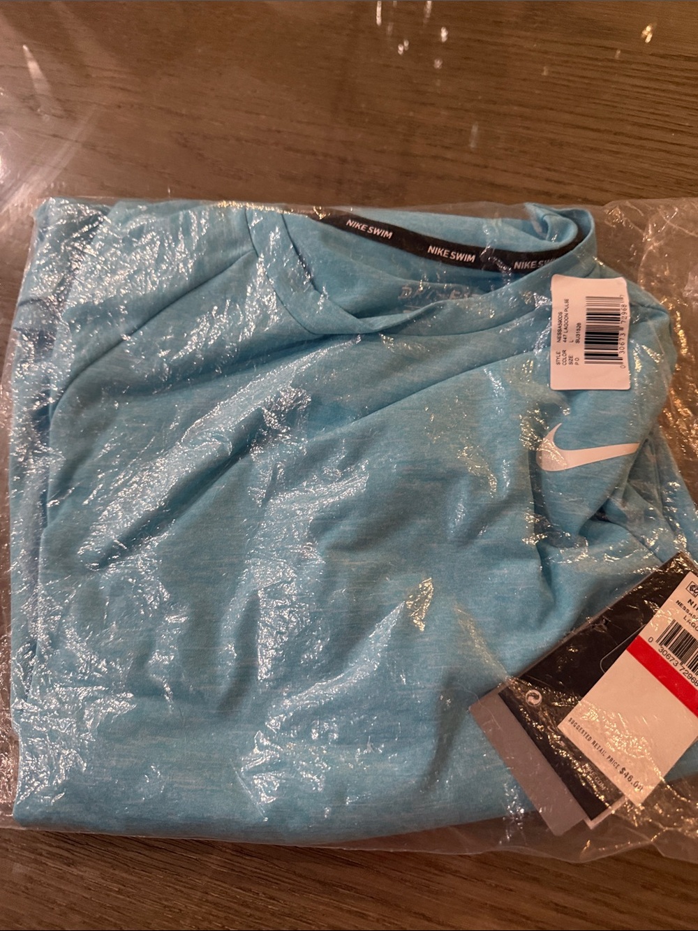 Nike Mens Large Light Blue Swim Tee with Swoosh